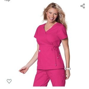 Koi Katelyn mock wrap scrub top in flamingo pink